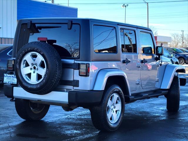 used 2013 Jeep Wrangler Unlimited car, priced at $13,999