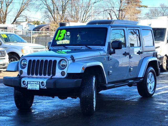 used 2013 Jeep Wrangler Unlimited car, priced at $13,999