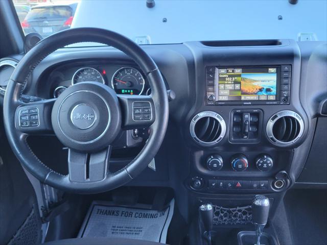 used 2013 Jeep Wrangler Unlimited car, priced at $13,999