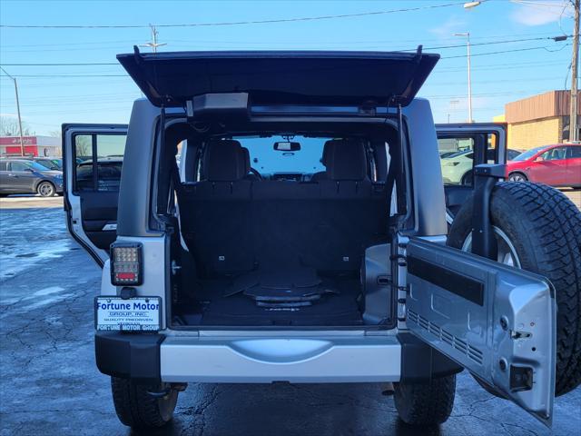 used 2013 Jeep Wrangler Unlimited car, priced at $13,999