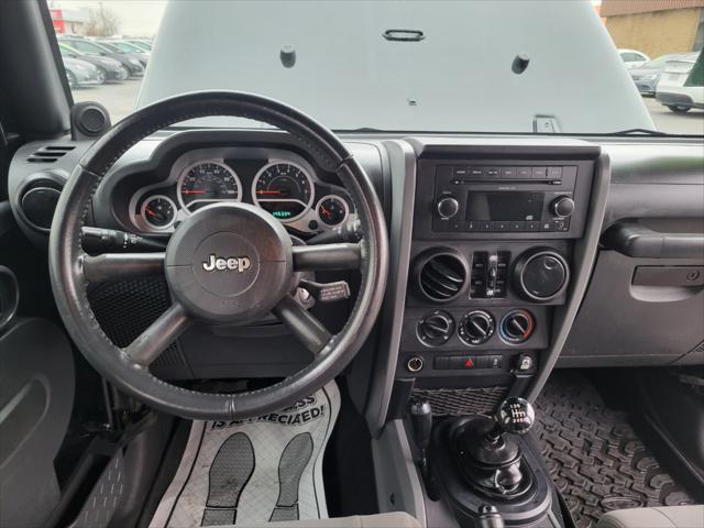 used 2010 Jeep Wrangler Unlimited car, priced at $10,999