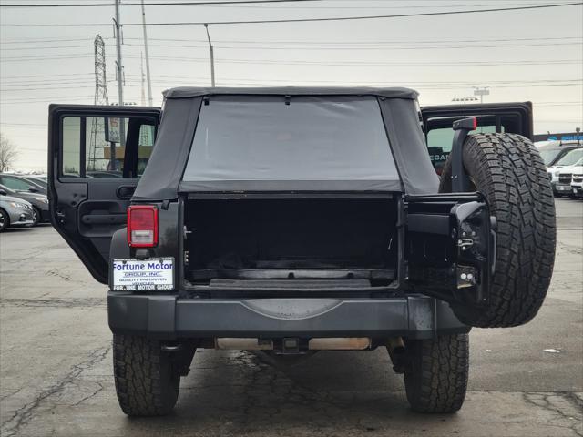 used 2010 Jeep Wrangler Unlimited car, priced at $10,999