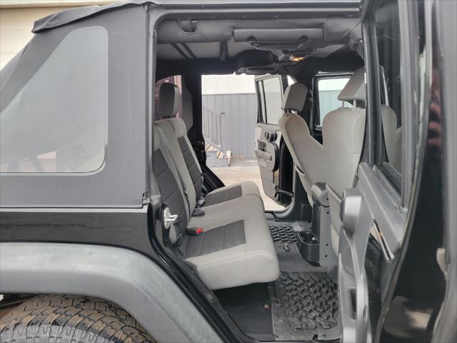 used 2010 Jeep Wrangler Unlimited car, priced at $10,999