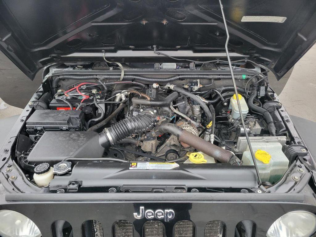 used 2010 Jeep Wrangler Unlimited car, priced at $9,499