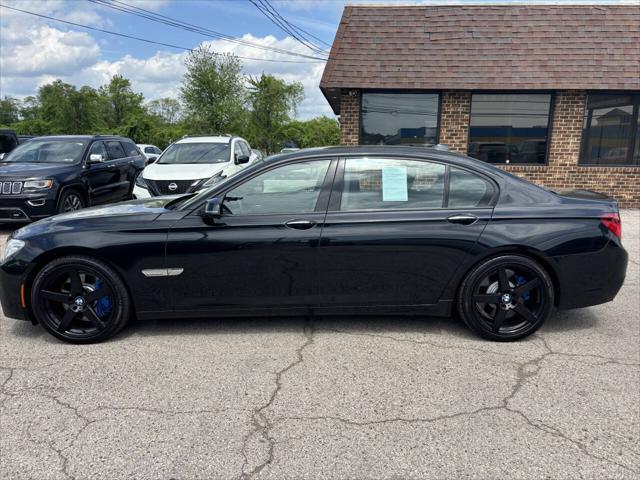 used 2014 BMW 750 car, priced at $18,900