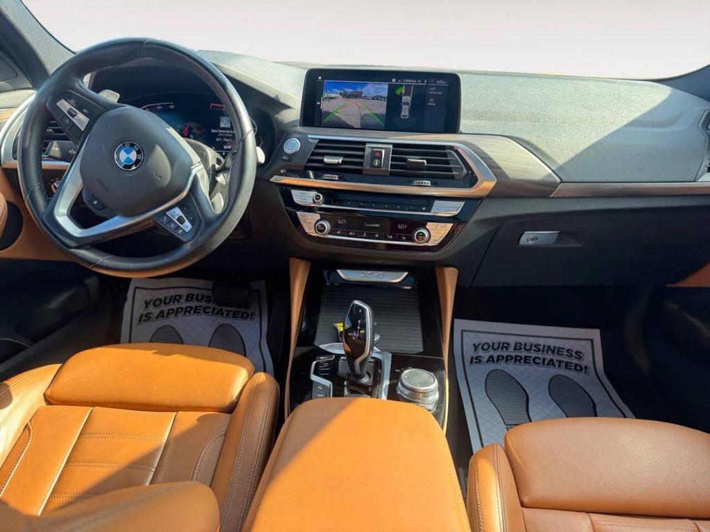 used 2021 BMW X4 car, priced at $26,900