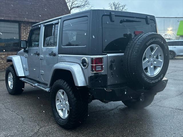 used 2014 Jeep Wrangler Unlimited car, priced at $21,500