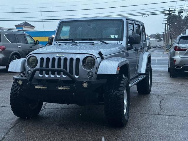 used 2014 Jeep Wrangler Unlimited car, priced at $21,500