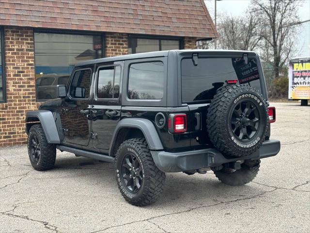 used 2020 Jeep Wrangler Unlimited car, priced at $28,300