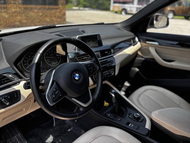 used 2018 BMW X1 car, priced at $18,900