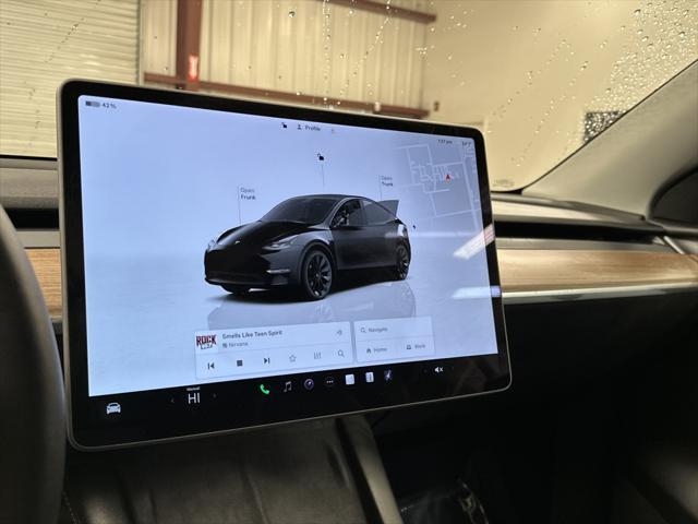 used 2025 Tesla Model Y car, priced at $40,997