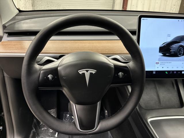 used 2025 Tesla Model Y car, priced at $40,997