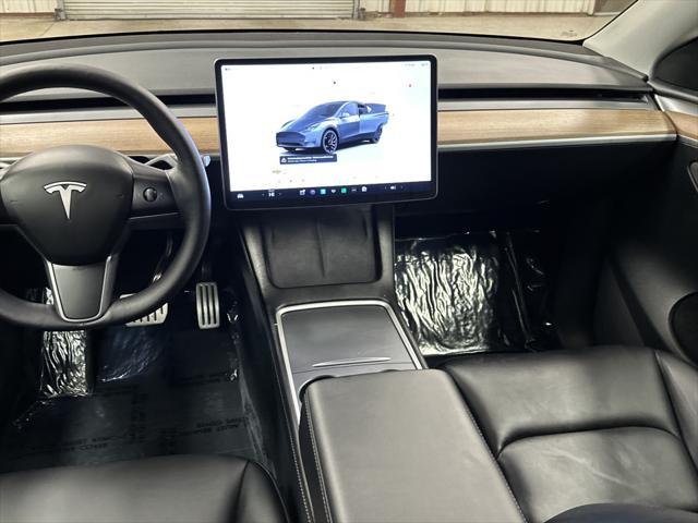 used 2023 Tesla Model Y car, priced at $36,497