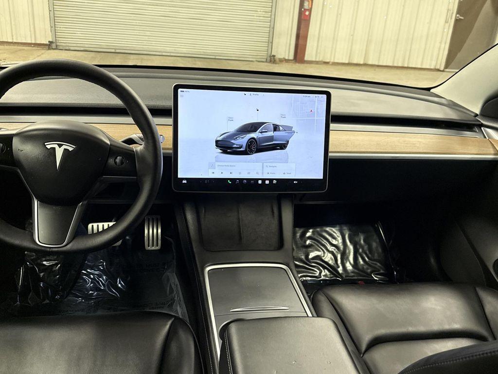 used 2023 Tesla Model 3 car, priced at $33,797
