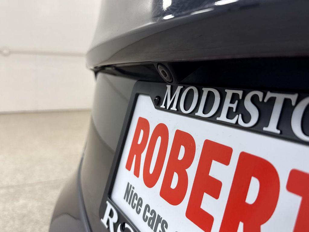 used 2023 Tesla Model 3 car, priced at $33,797