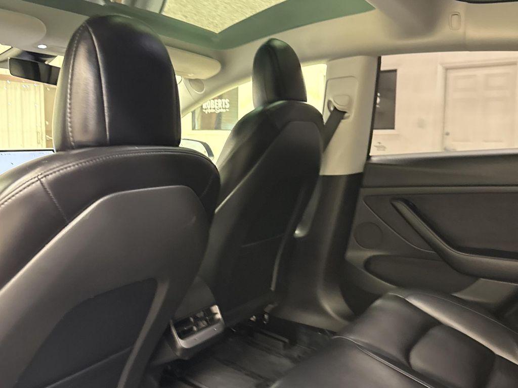 used 2023 Tesla Model 3 car, priced at $33,797