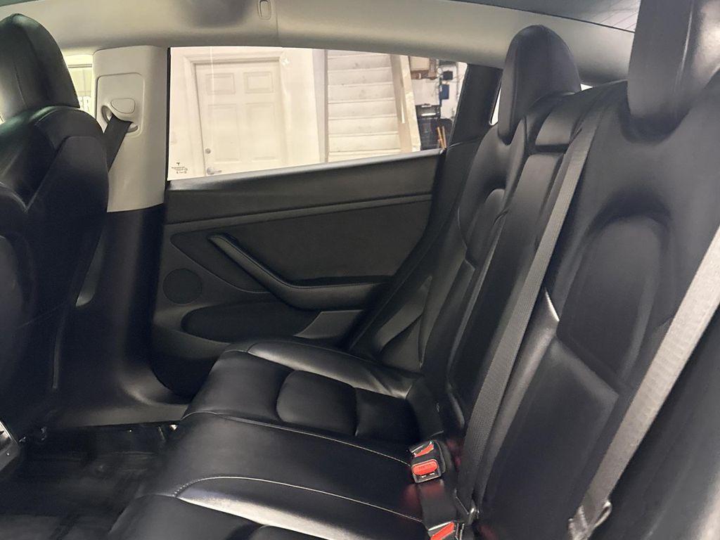 used 2023 Tesla Model 3 car, priced at $33,797