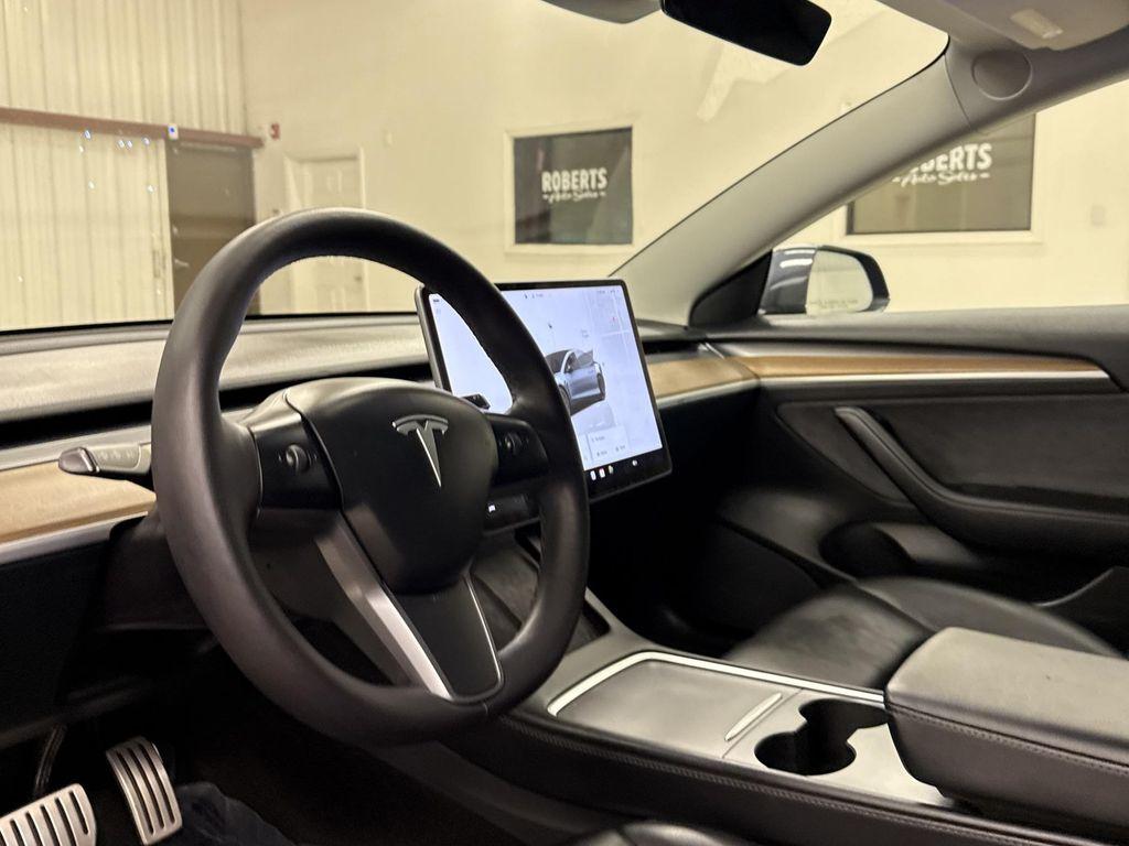 used 2023 Tesla Model 3 car, priced at $33,797