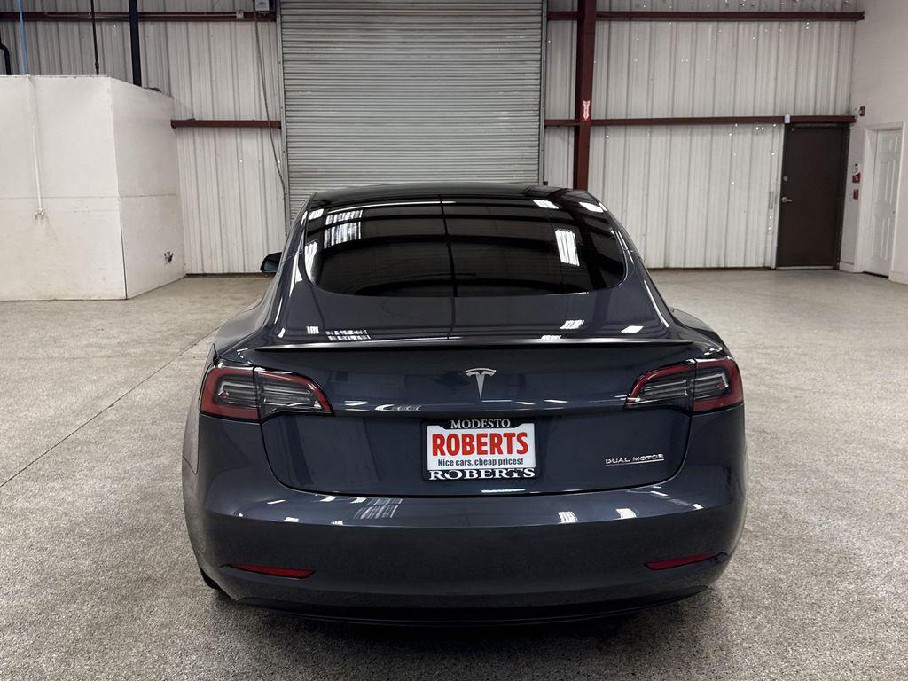 used 2023 Tesla Model 3 car, priced at $33,797