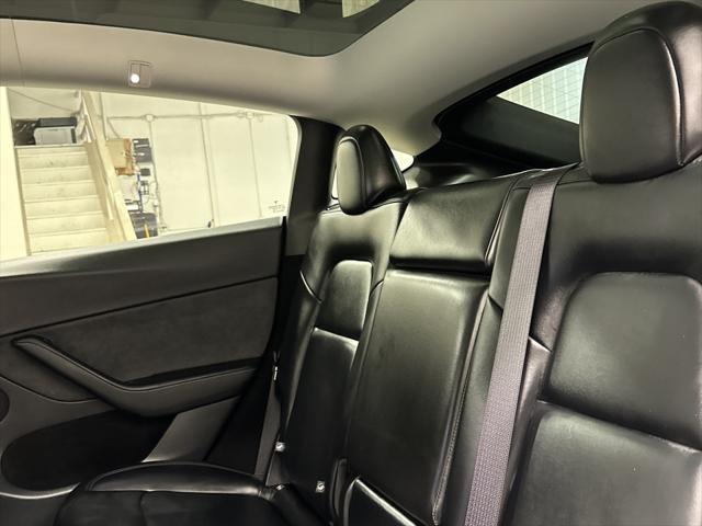 used 2025 Tesla Model Y car, priced at $41,997