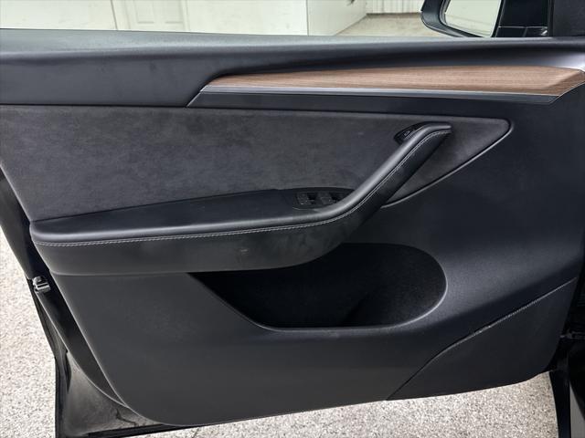 used 2025 Tesla Model Y car, priced at $41,997