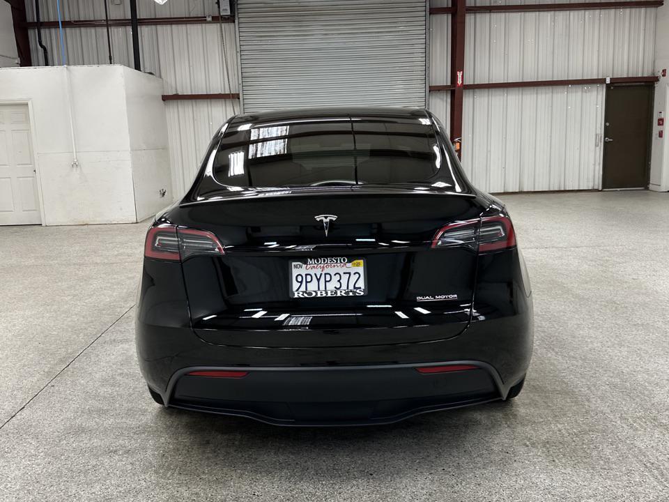 used 2025 Tesla Model Y car, priced at $41,297