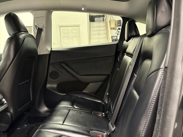 used 2025 Tesla Model Y car, priced at $41,997