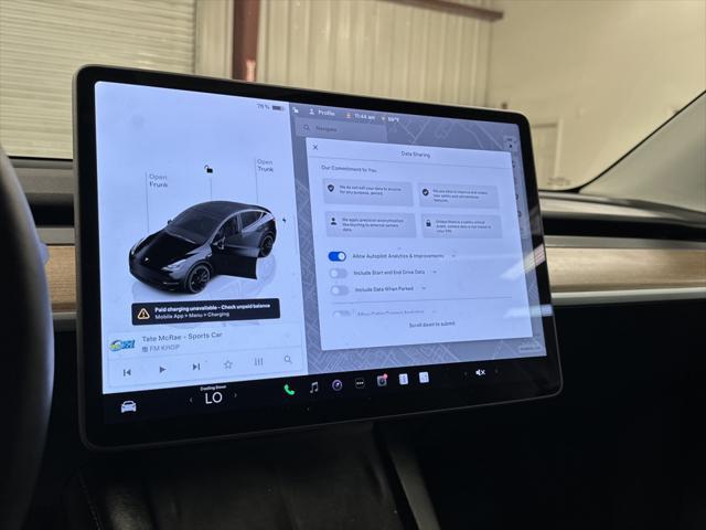 used 2025 Tesla Model Y car, priced at $41,997