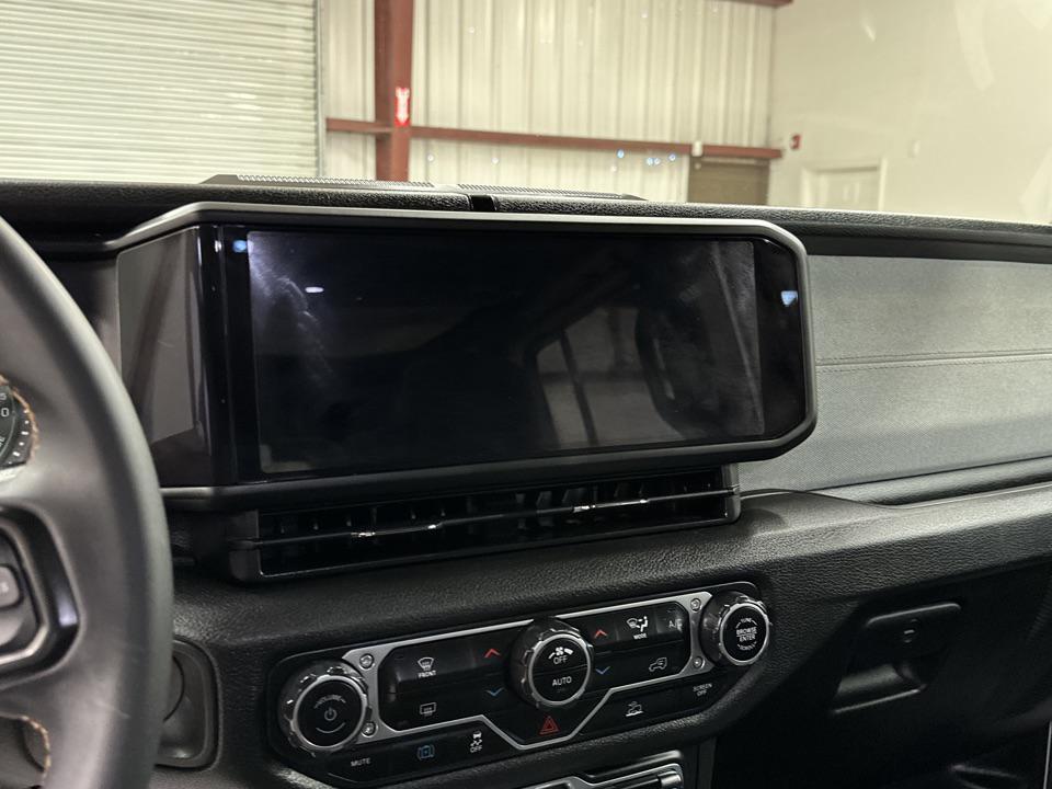 used 2024 Jeep Wrangler 4xe car, priced at $33,997