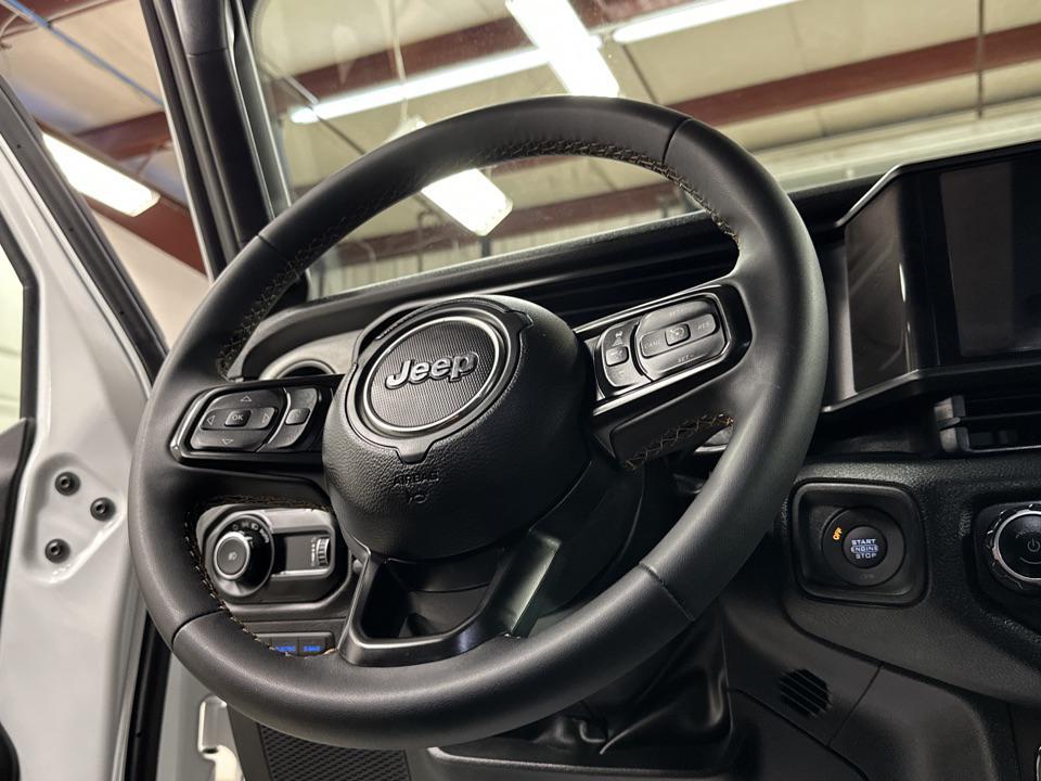 used 2024 Jeep Wrangler 4xe car, priced at $33,997