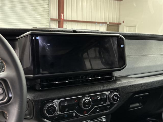 used 2024 Jeep Wrangler 4xe car, priced at $38,497