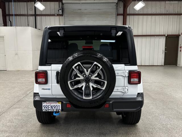used 2024 Jeep Wrangler 4xe car, priced at $38,497