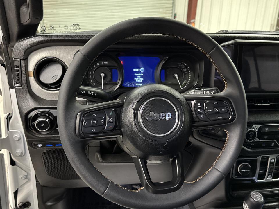 used 2024 Jeep Wrangler 4xe car, priced at $33,997