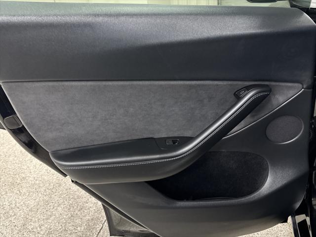 used 2025 Tesla Model Y car, priced at $39,997