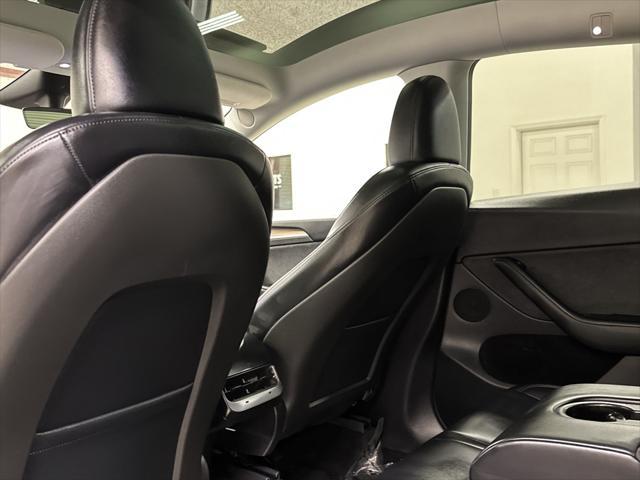 used 2025 Tesla Model Y car, priced at $39,997