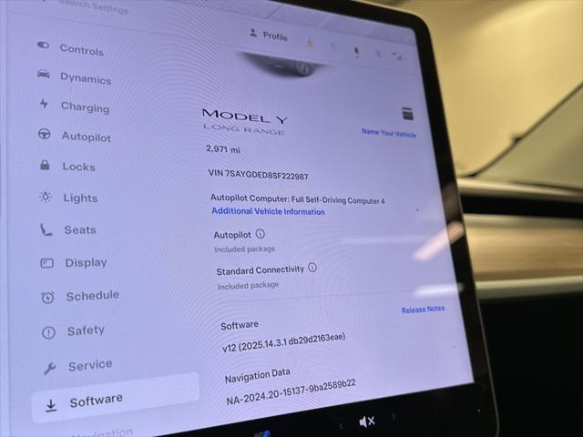 used 2025 Tesla Model Y car, priced at $39,997