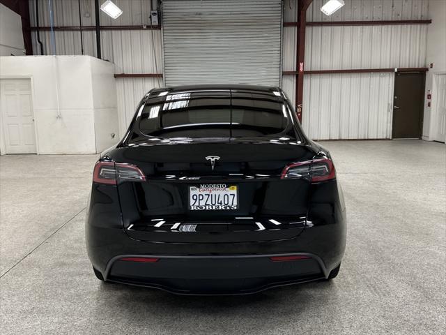 used 2025 Tesla Model Y car, priced at $39,997
