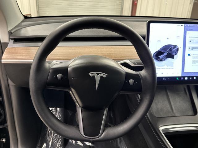 used 2025 Tesla Model Y car, priced at $39,997