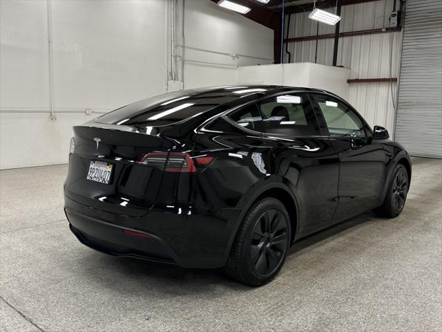 used 2025 Tesla Model Y car, priced at $39,997