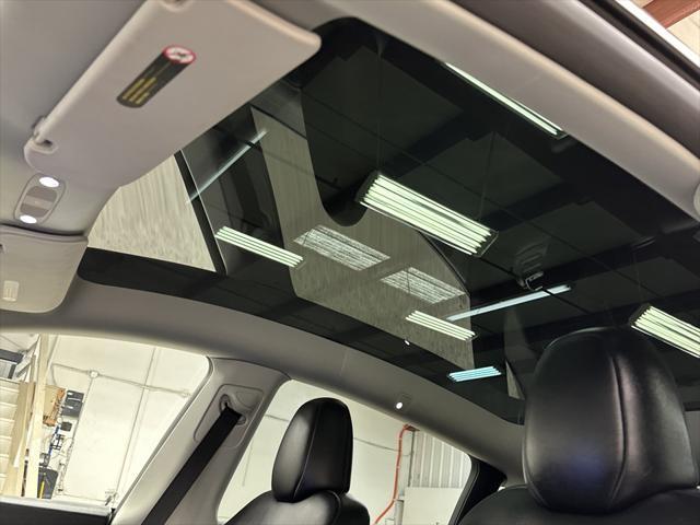 used 2025 Tesla Model Y car, priced at $39,997
