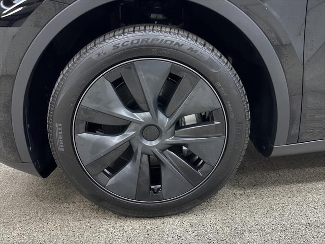used 2025 Tesla Model Y car, priced at $39,997