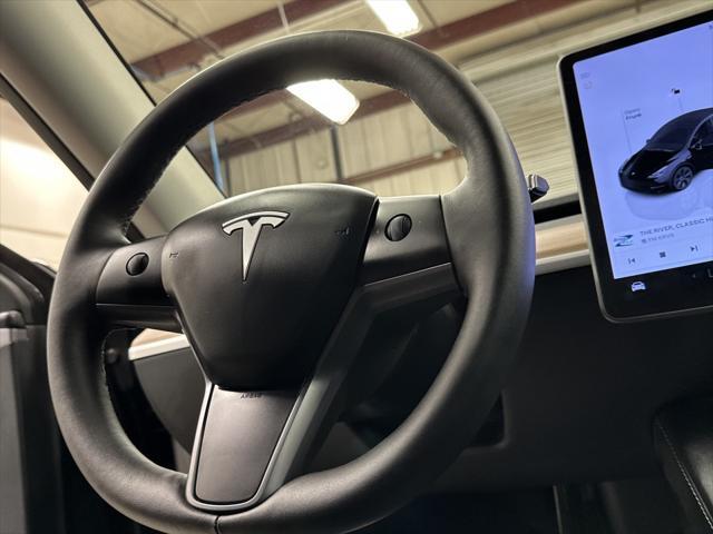 used 2025 Tesla Model Y car, priced at $39,997