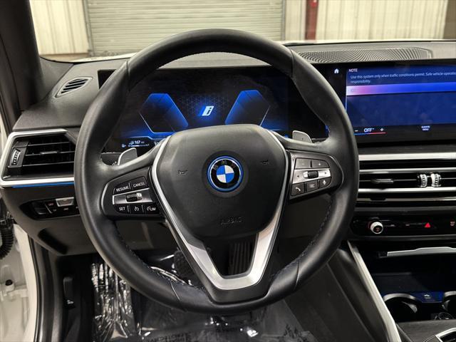 used 2023 BMW 330e car, priced at $34,997
