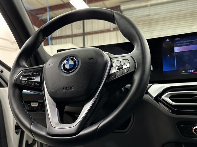 used 2023 BMW 330e car, priced at $34,997
