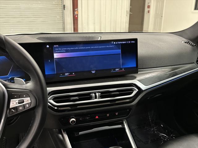 used 2023 BMW 330e car, priced at $34,997