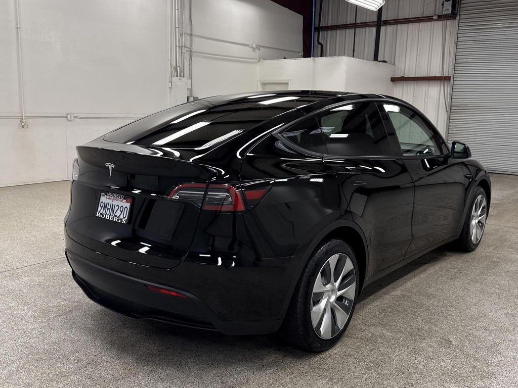 used 2024 Tesla Model Y car, priced at $34,997