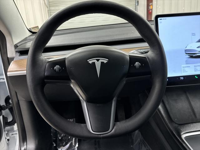 used 2023 Tesla Model 3 car, priced at $29,497