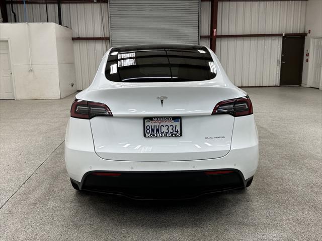 used 2021 Tesla Model Y car, priced at $28,497