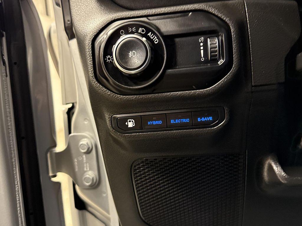 used 2023 Jeep Wrangler 4xe car, priced at $33,497
