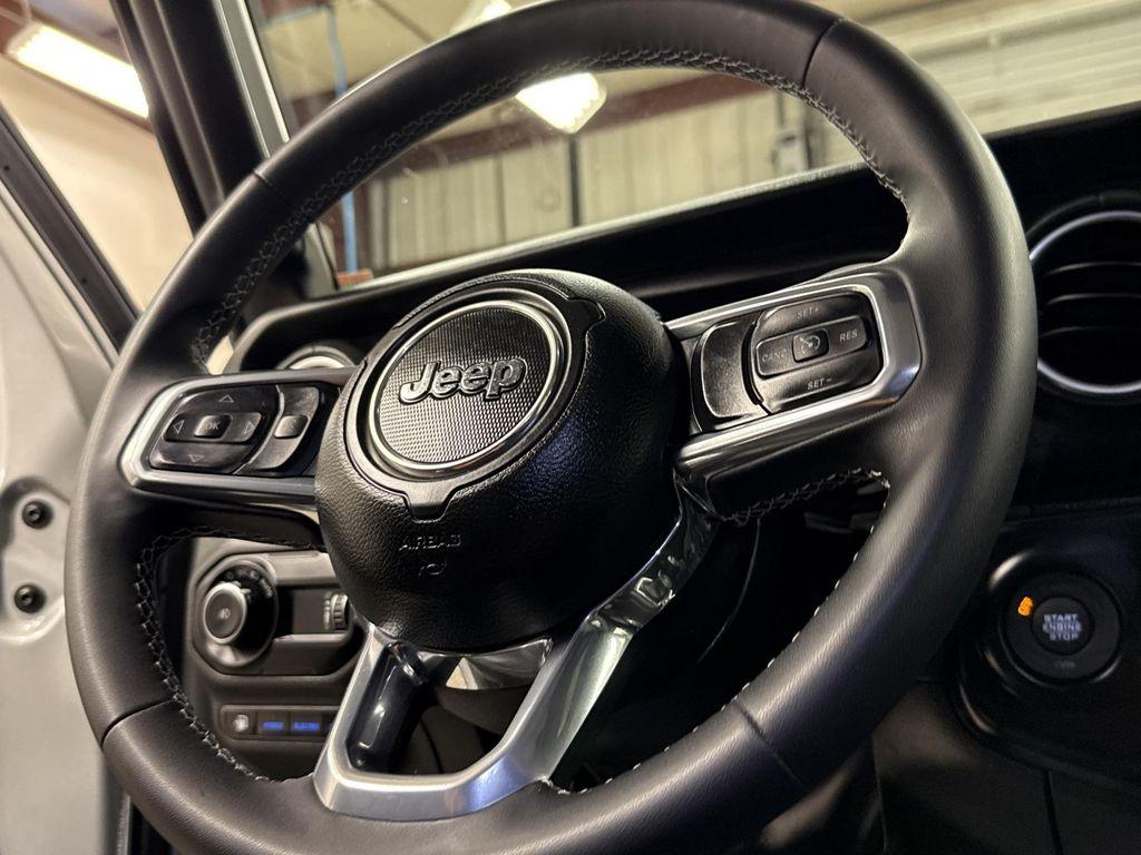 used 2023 Jeep Wrangler 4xe car, priced at $33,497